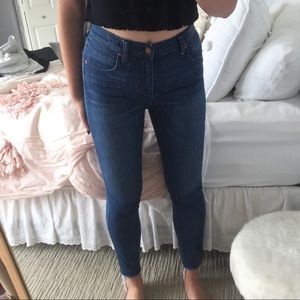 MADEWELL dark wash skinnies with fray detail 💘